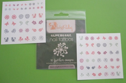 big ruby tattoos-garden designed nail tattoos